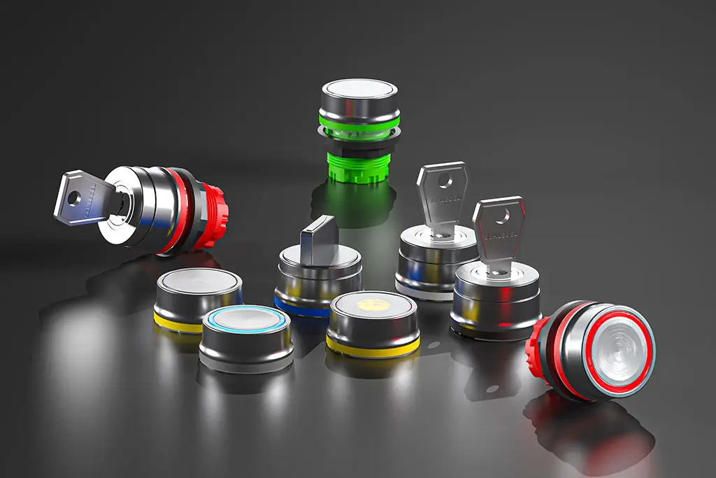 Not-Halt-Taster, Drucktasten, Schlüsselschalter und Wahlschalter auf einer schwarz-spiegelnden Oberfläche. Manche Taster liegen, andere stehen.